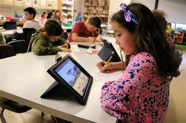 Norah Laasri works on her art project 